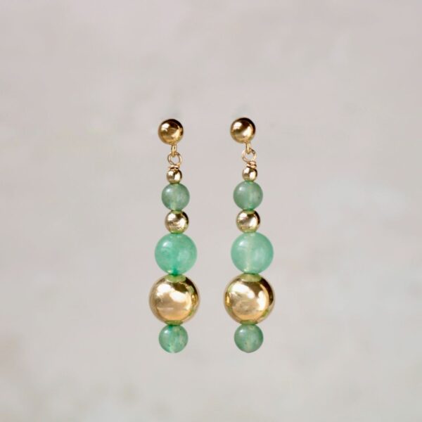 Gold and green beaded drop earrings.