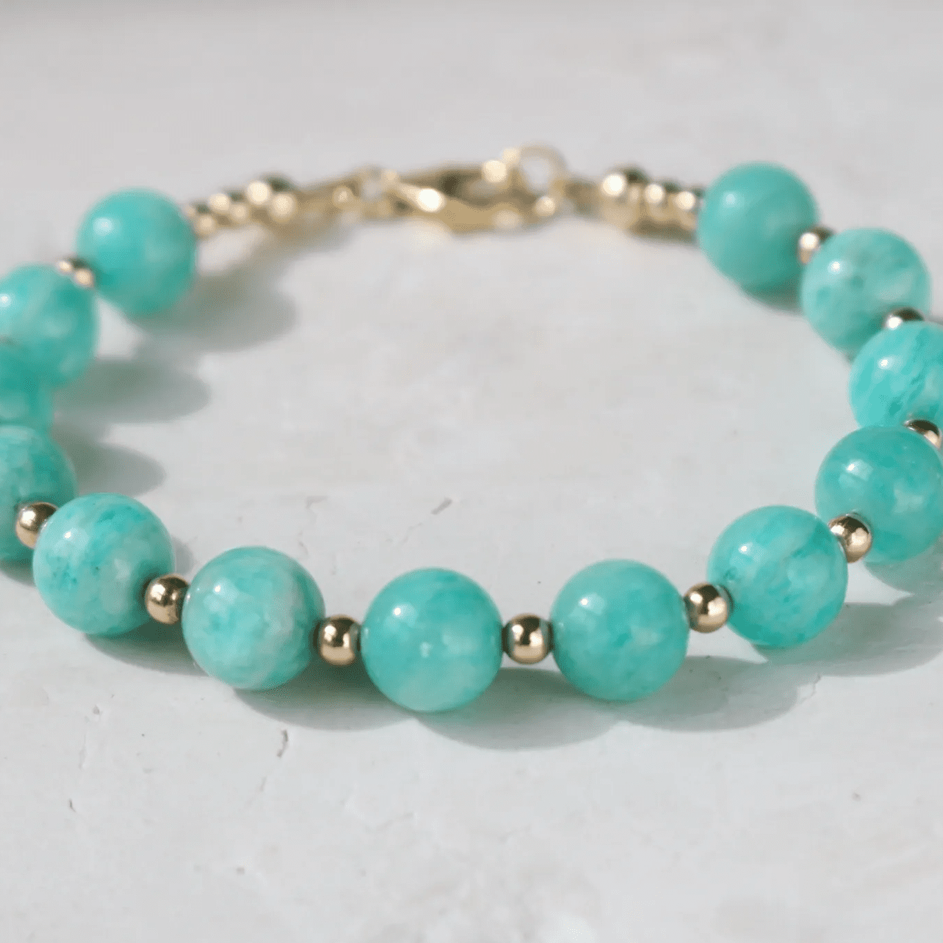 Turquoise beaded bracelet with gold spacer beads